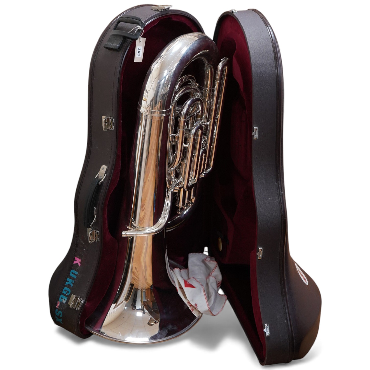 A cased Besson Sovereign tuba, together with three mouthpieces; an Alliance H2, and two by Denis Wick, London